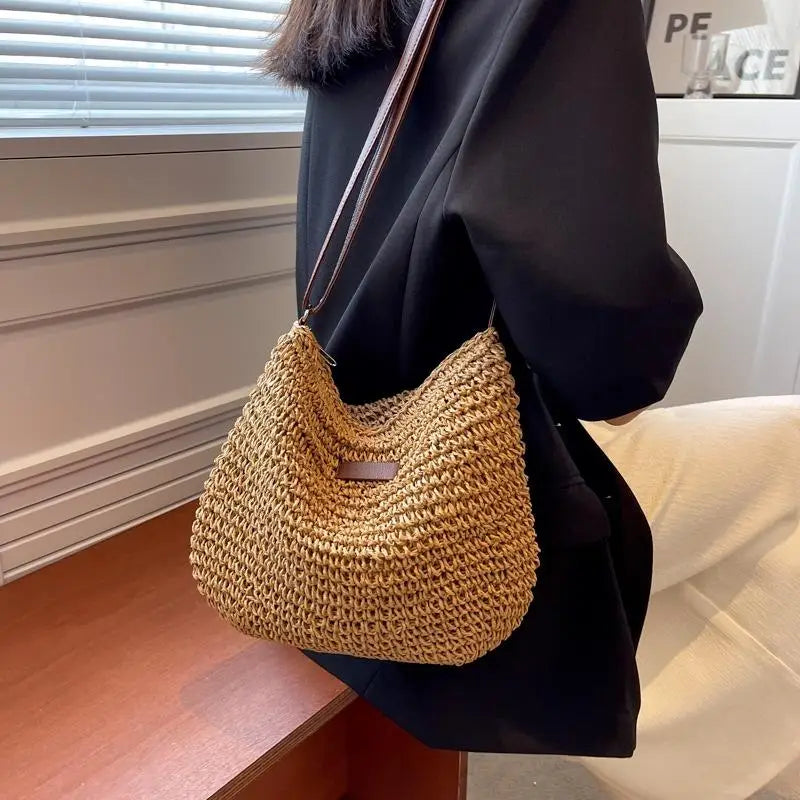 "Get ready for summer with this stylish straw crossbody bag! Perfect for beach days, holiday travels, and shopping sprees. #Fashion #SummerStyle"