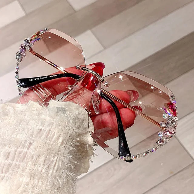 "Get ready to shine with our Luxury Vintage Sunglasses! 😎✨ Perfect for both women and men, these rimless shades feature rhinestone details and gradient lenses. Stay stylish in the sun! ☀️ #Fashion #SunGlasses #VintageStyle"