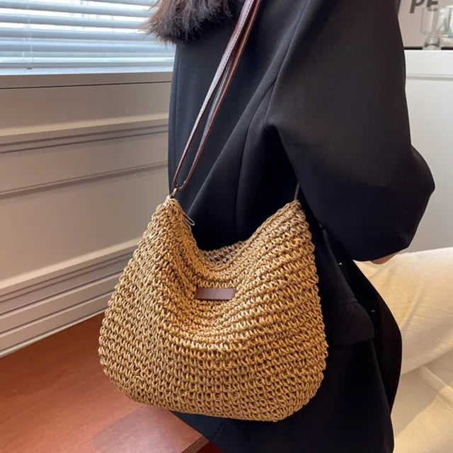 "Get ready for summer with this stylish straw crossbody bag! Perfect for beach days, holiday travels, and shopping sprees. #Fashion #SummerStyle"