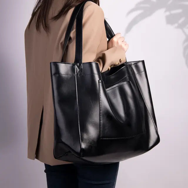 "Upgrade your everyday style with this chic Oil Wax Leather Tote Bag! Perfect for work or daily errands. #Fashion #ToteBag #Leather"