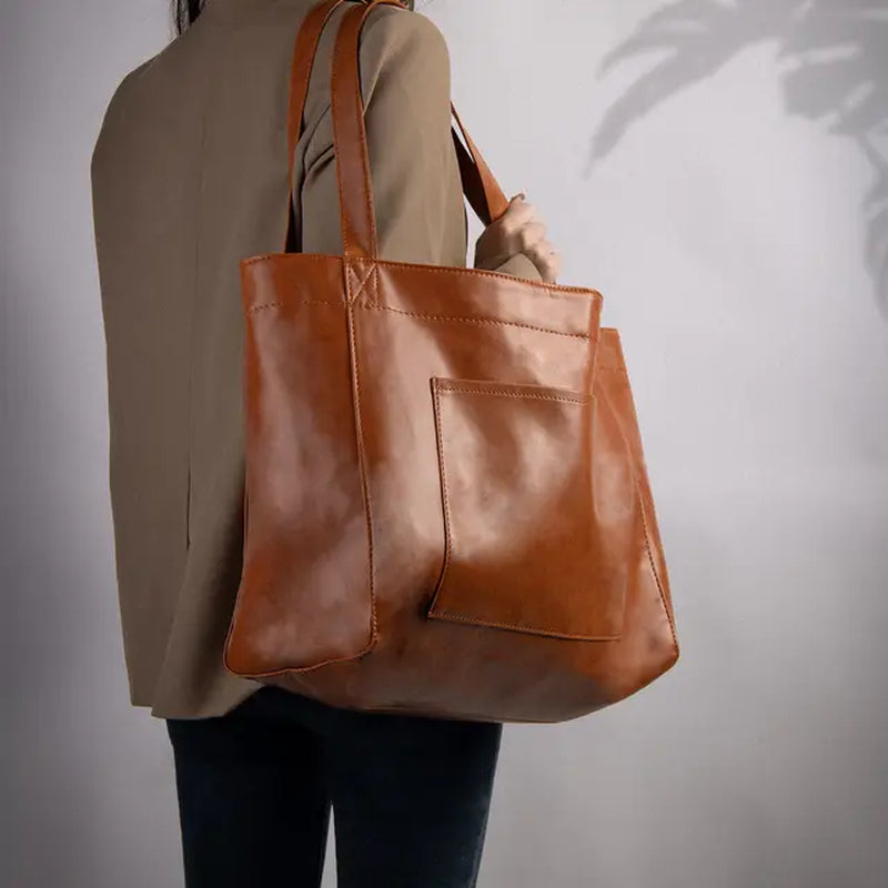 "Upgrade your everyday style with this chic Oil Wax Leather Tote Bag! Perfect for work or daily errands. #Fashion #ToteBag #Leather"